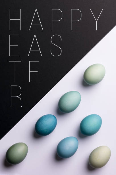istock Happy Easter black and white background. Hand painted blue Easter eggs abstract minimal concept. 938219214