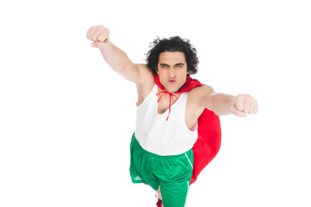 istock Superhero in red cape depicting flying isolated on white 938223458