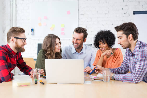 istock Creative business people brainstorming at office 938225650