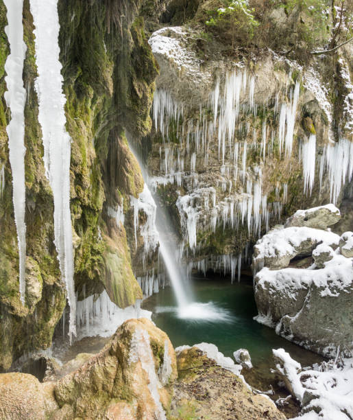 istock Amazing icicles and waterfall gorge on cold winter day. Hinanger Waterfall, Bavaria, Germany 938226818