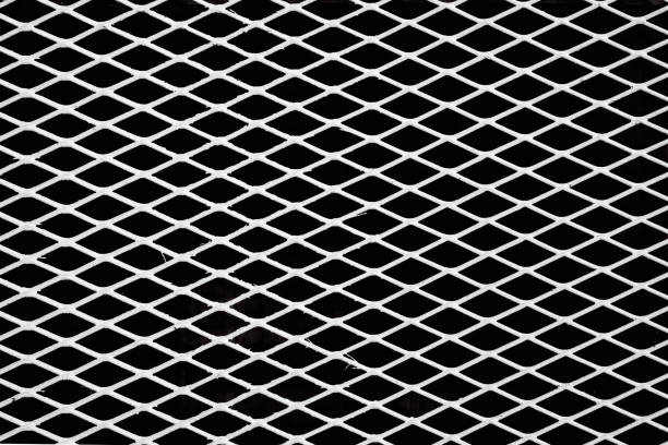 istock Black and white diagonal metal wire grid 938227042
