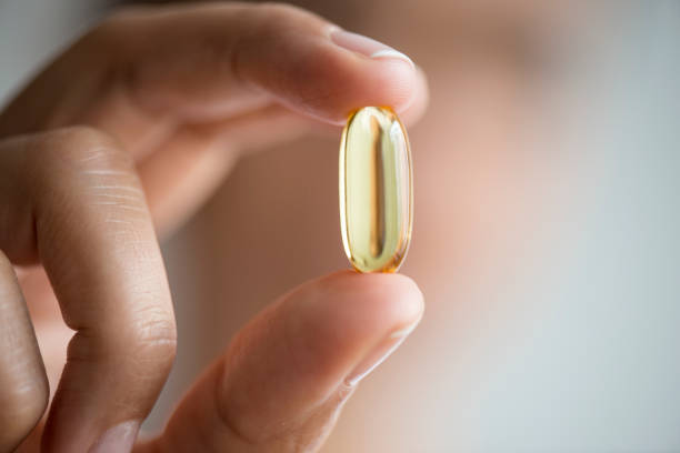istock Woman Showing A Pill 938230324