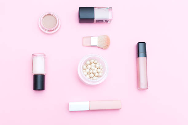 istock Decorative cosmetics  nude color on a pink background. Isometric style 938230904