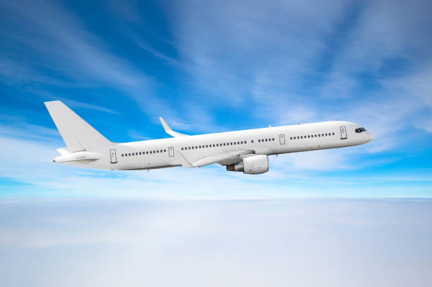 istock Passenger airplane fly on a hight above overcast clouds and blue sky. 938233968