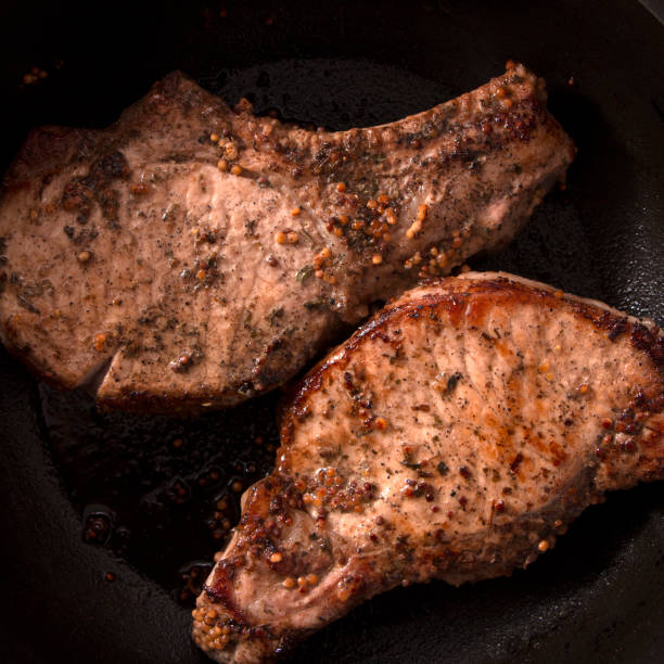 istock grilled beef steak with rosemary, frying pan 938234986