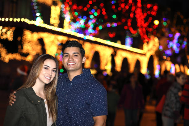 istock Couple at Christmas Lights Left Horizontal 938237742