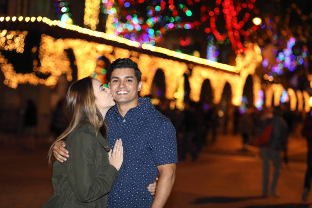 istock Couple at Christmas She Kisses 938238986