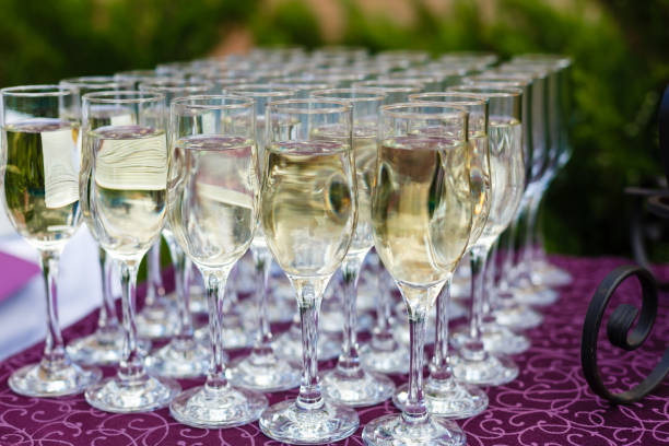 istock Rows of empty glasses of wine from an angle 938258324