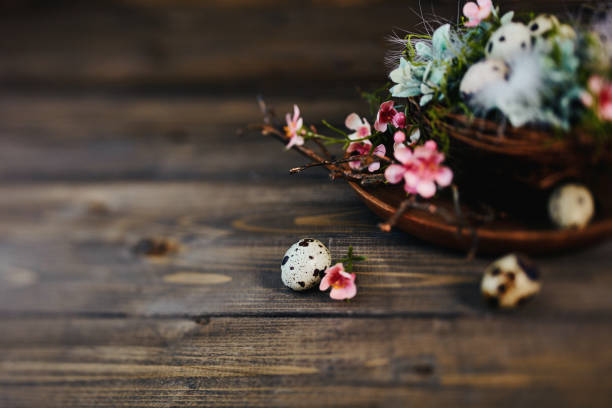 Easter background with nest and quail eggs