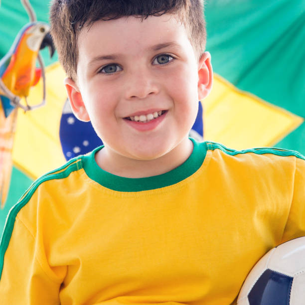 istock Young Brazilian boy soccer supporter 938259122