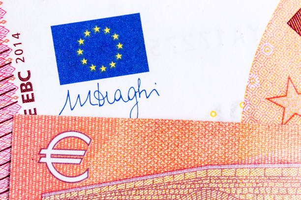 istock euro banknotes close-up with euro flag.Background 938262694