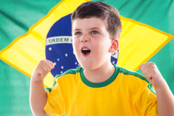 istock Young Brazilian boy soccer supporter 938265290