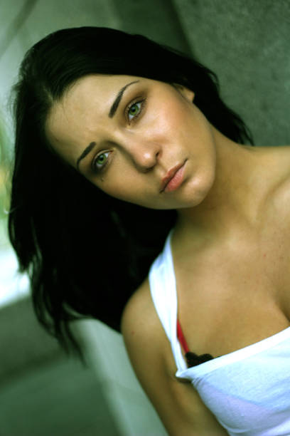 istock Sad young woman portrait 938265472