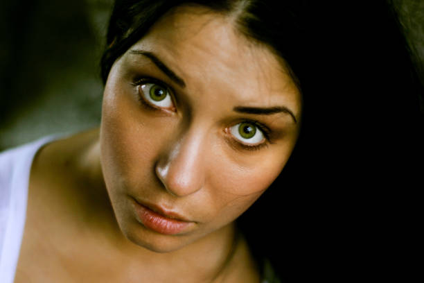 istock Worried young woman portrait 938265584
