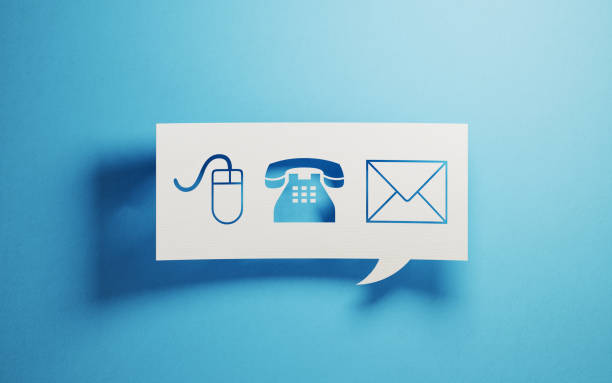 istock White Chat Bubble With Various Contact Us Symbols On Blue Background 938271938