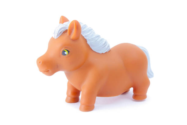 istock Children rubber horse 938272324