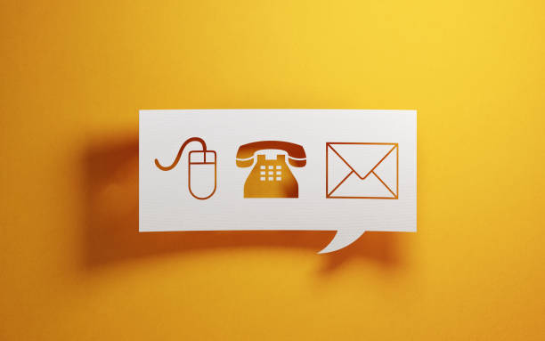 White Chat Bubble With Various Contact Us Symbols On Yellow Background