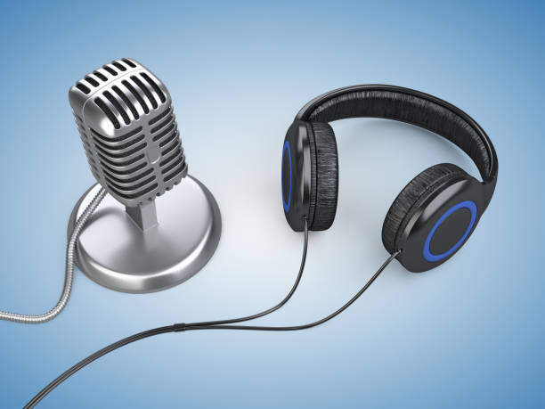 istock Live studio microphone and modern professional headphones. 938280886
