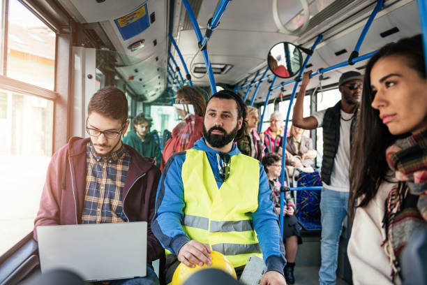 istock Different people commuting by public bus in France 938283204