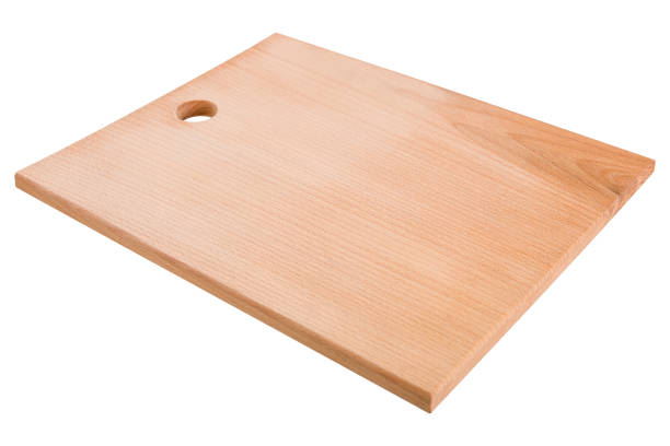 istock wooden wide cutting board, beech tree, new board on white background 938299088