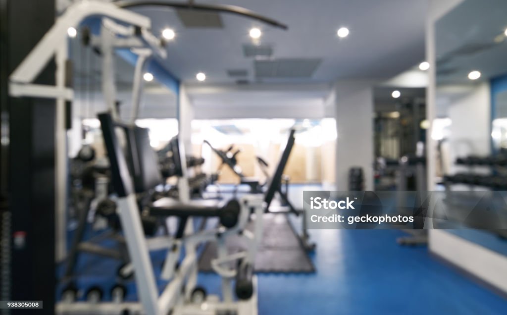 Abstract blurred of fitness gym interior with exercise equipment Abstract blurred of fitness gym interior with exercise equipment, background for banner presentation. Gym Stock Photo