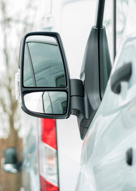 istock Side mirrors from the new white delivery van 938307770