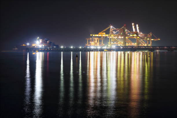 istock Night view of the factory and reflection 938308264