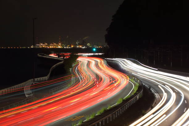 istock Light trace of car and night view 938308418