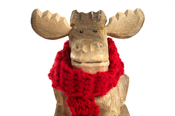 Close up of christmas hat holiday background with red santa hat and decorations on christmas antlers of a deer and Festive Happy New Year object
