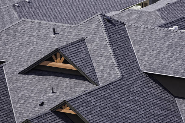 Rooftop in a newly constructed subdivision showing asphalt shingles Rooftop in a newly constructed subdivision showing asphalt shingles and multiple roof lines gable photos stock pictures, royalty-free photos & images