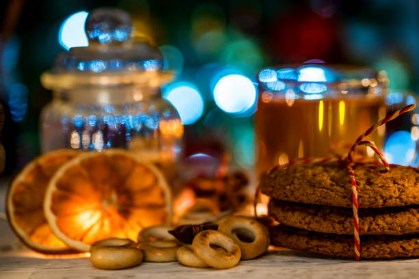 istock Cozy still life of tea, christmas light and pastry 938323200
