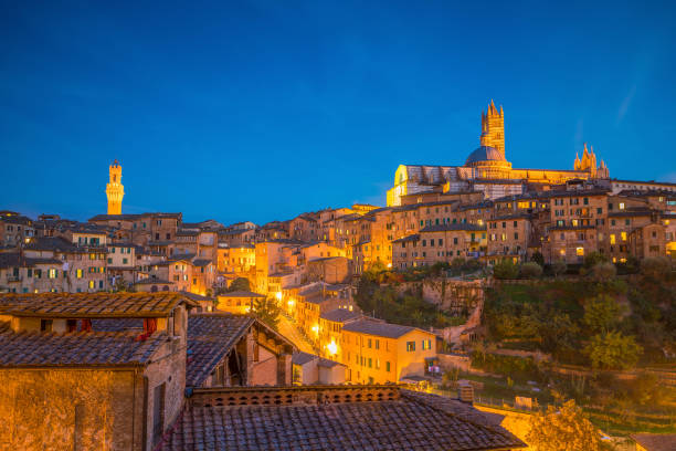istock Downtown Siena skyline in Italy 938325904