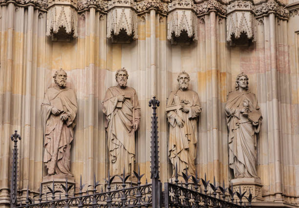 istock Four Men on Church in Barcelona 938326028