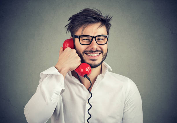 istock Happy man talking on phone enjoying service 938329630