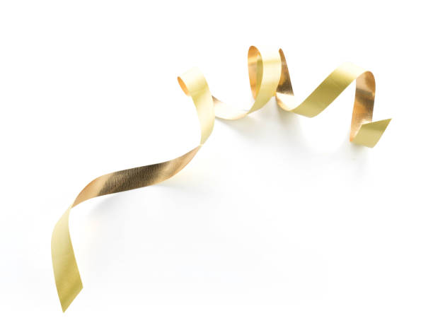 istock Golden ribbon roll isolated on white background 938330042