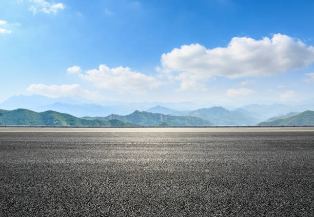 istock asphalt highway and hill landscape under the blue sky 938333150