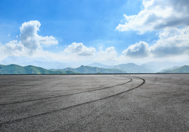 istock asphalt road and hill landscape under the blue sky 938333164