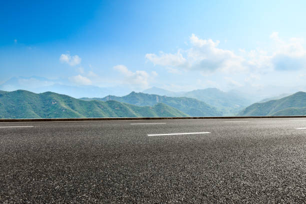 istock asphalt highway and hill landscape under the blue sky 938335512