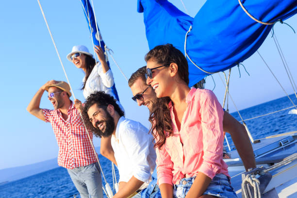 istock Young people traveling with an yacht 938335588