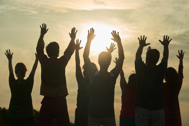 istock People are dancing at open-air rave live concert. 938340474