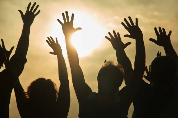 istock Dancing people at rock concert. 938340528