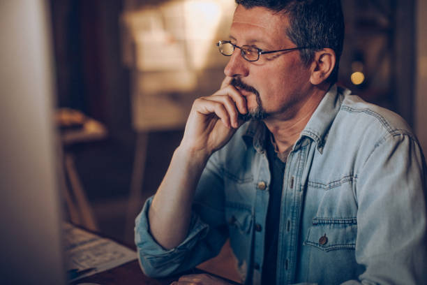 istock Mid adult man in office 938345808