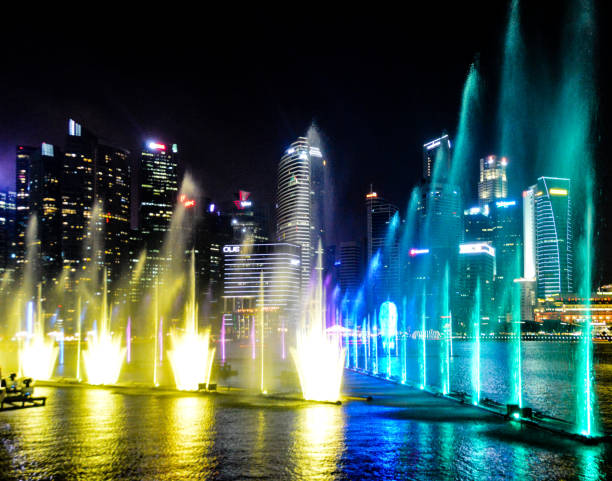 istock Singapore urban skyline and cityscape illuminated at night 938361106