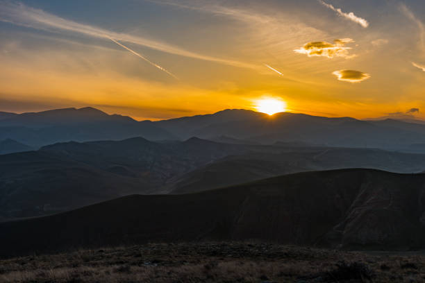 istock Colorful bright sunset in the mountains 938363414