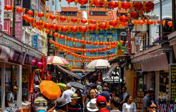 istock People shopping in Chinatown - Singapore 938369036