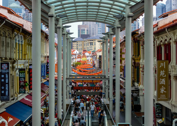 istock People shopping in Chinatown - Singapore 938369056