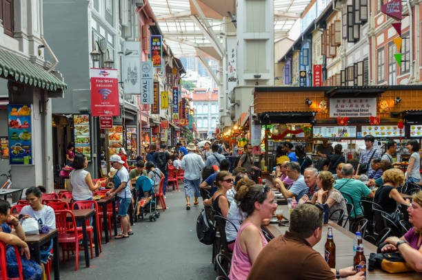 istock People shopping and eating in Chinatown - Singapore 938369064