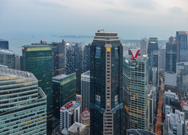 istock Singapore urban skyline and cityscape illuminated at night 938371620