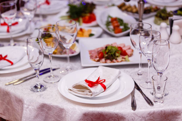istock Served table in restaurant with dishes and glasses 938372588