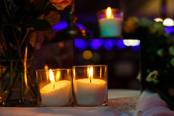 istock Main table at a wedding reception lit with fairy lights 938374964